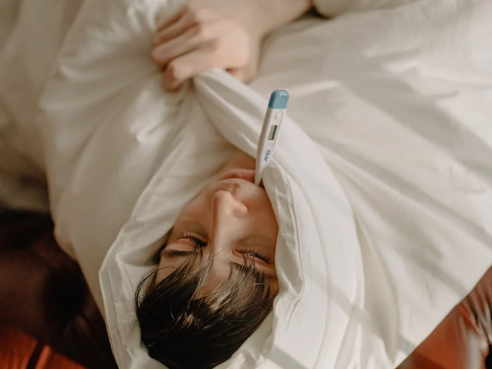 Man in White Shirt Lying on Bed