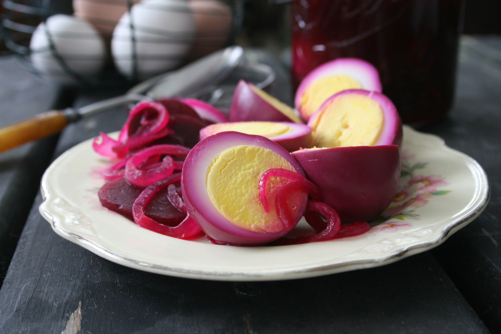 Pickled in Beet Juice Hard Boiled Eggs with Sliced Beets and Onions
