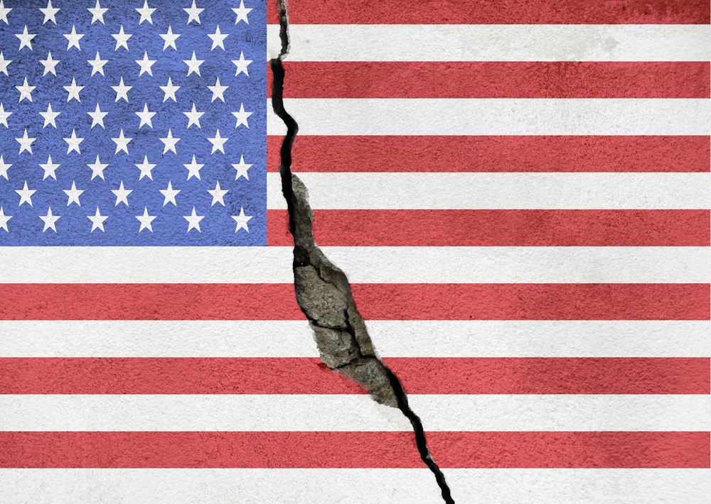 America divided concept, american flag on cracked background. US elections, polarization and division between republicans and democrats, rich and poor, educated and non educated people
