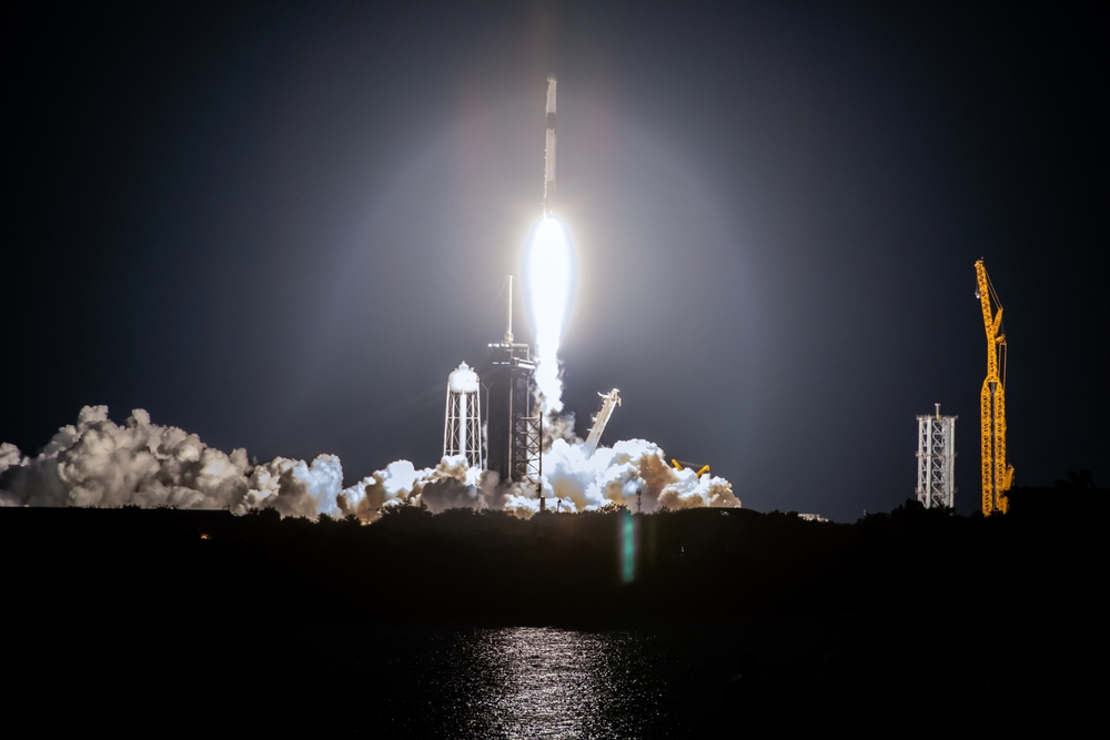 SpaceX rocket Falcon 9 rocket capsule soars upward after lifting off from launch pad. Digitally enhanced. Elements of this image furnished by NASA.
