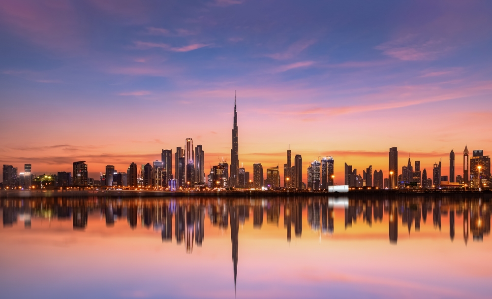 Panoramic Dubai skyline with Reflection in Pastel Sunset colors
