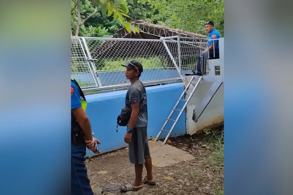 Zoo guards and police stand by crocodile attack victim