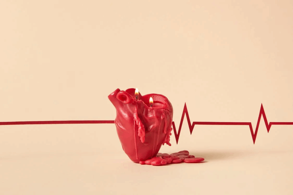 Photograph of a Lit Red Heart Candle