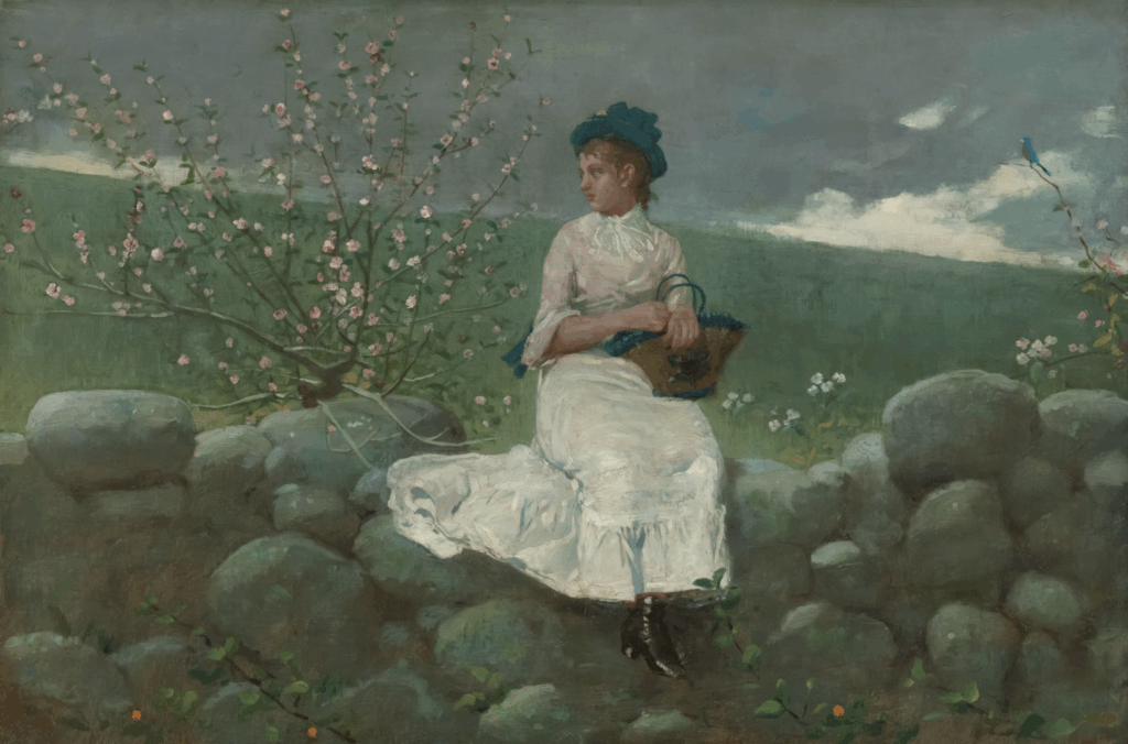 Woman in Victorian-era white dress sitting on stone wall amid cherry blossoms, exemplifying the historical evolution of feminine sitting postures when long dresses required modest positioning.