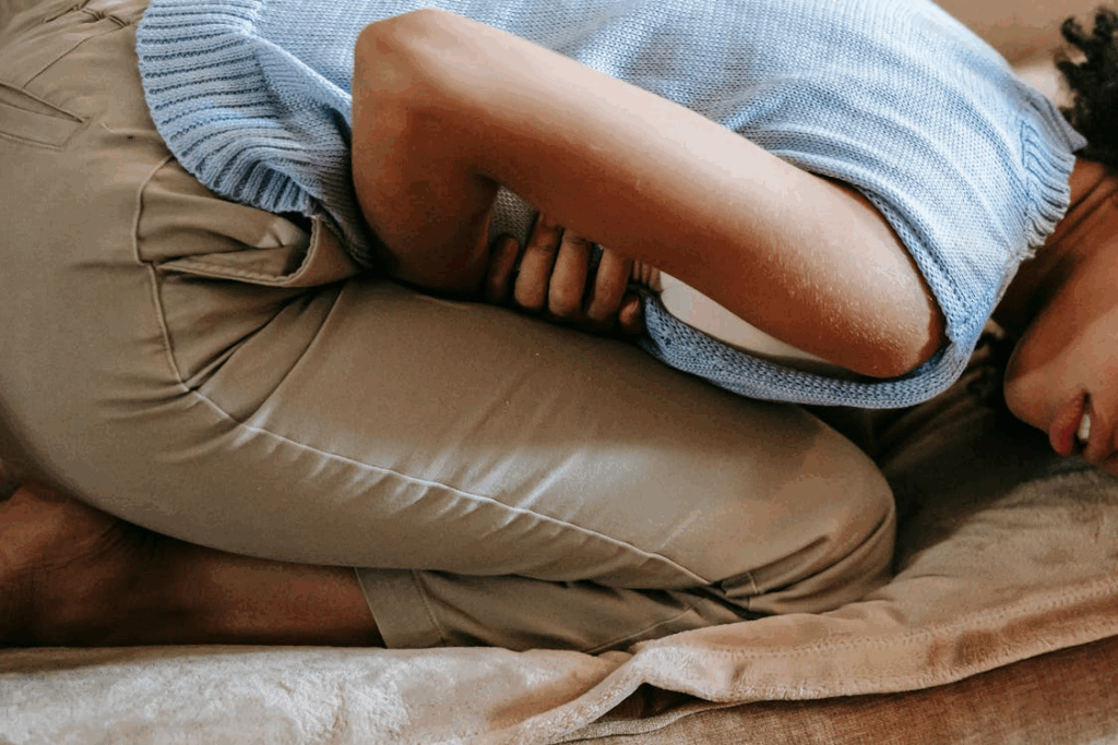 Woman Suffering from a Stomach Pain