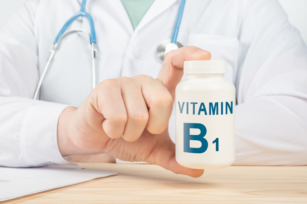 Vitamins and supplements for human health. Doctor recommends taking vitamin B1. doctor talks about Benefits of vitamin B1. Essential vitamins and minerals for humans. B1 Vitamin Health Concept.