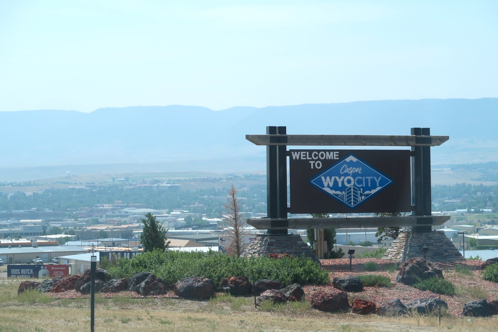 Casper, WY USA - July 27, 2024: Welcome to the city sign. Overlook of town from highway. Interstate I-25