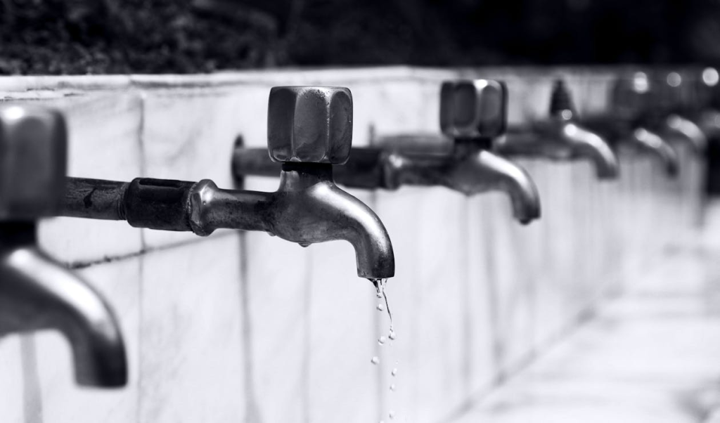 Water Drops from Faucet
