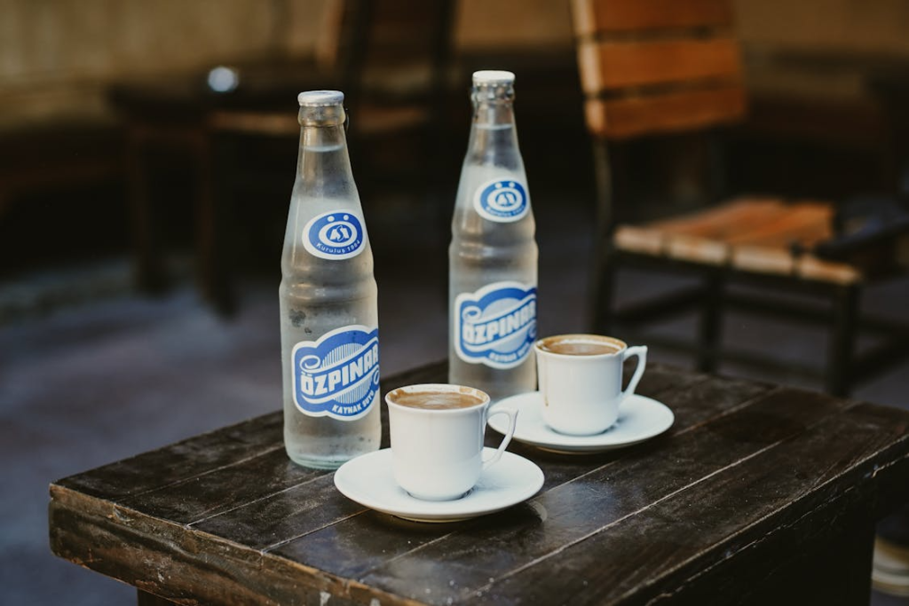 White Ceramic Cups on the Table
