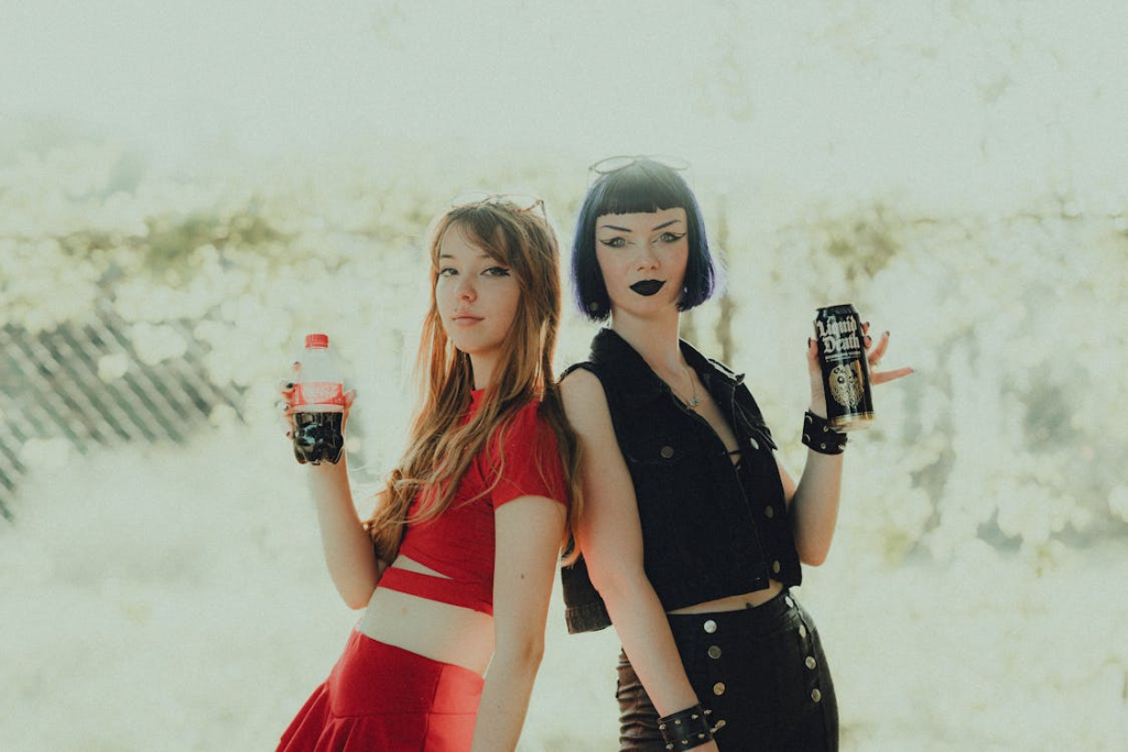 Women Holding Beverages
