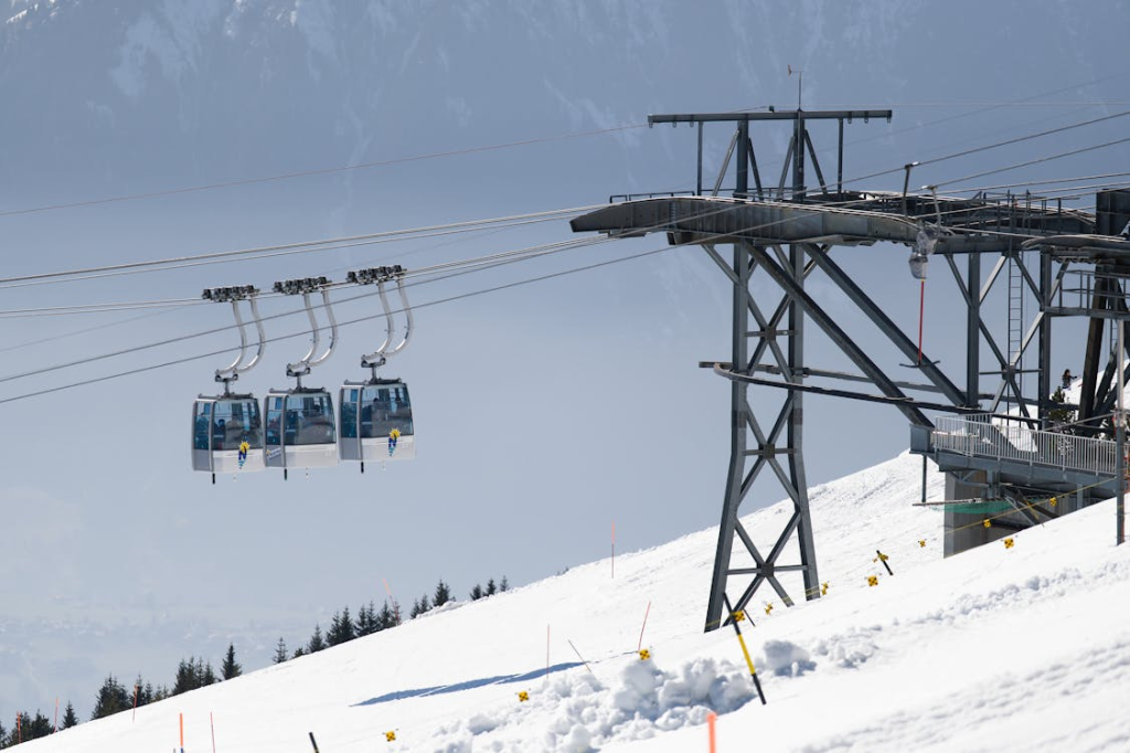 Ski Lift Over Snowy Alpine Slopes
