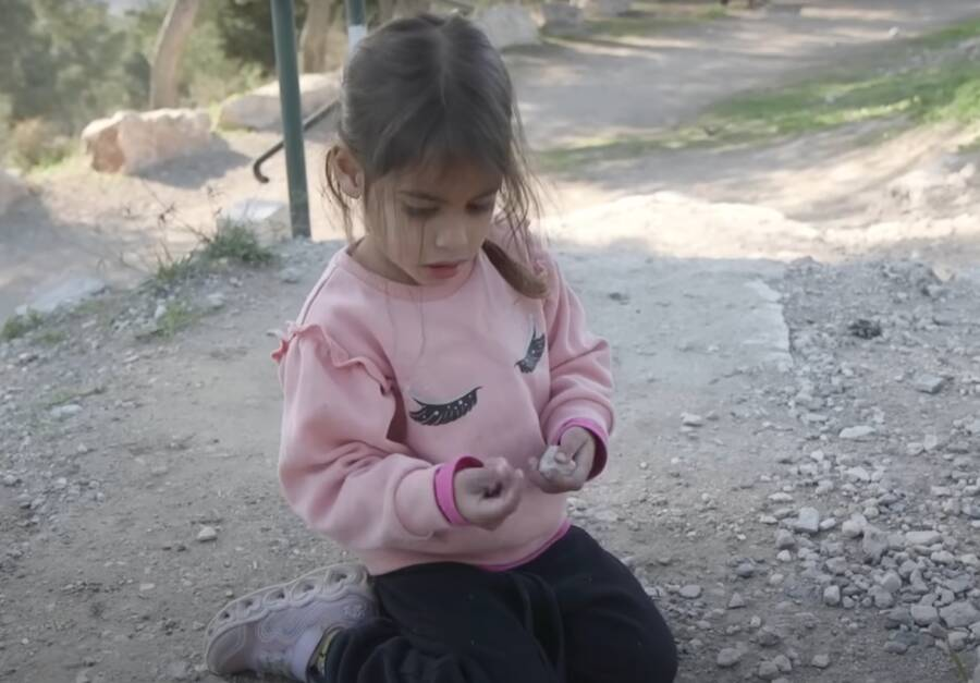 Three-year-old Ziv Nitzan found an ancient Canaanite amulet while hiking in Israel with her family