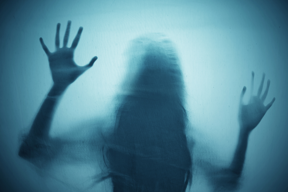 Shadow of scary ghost woman