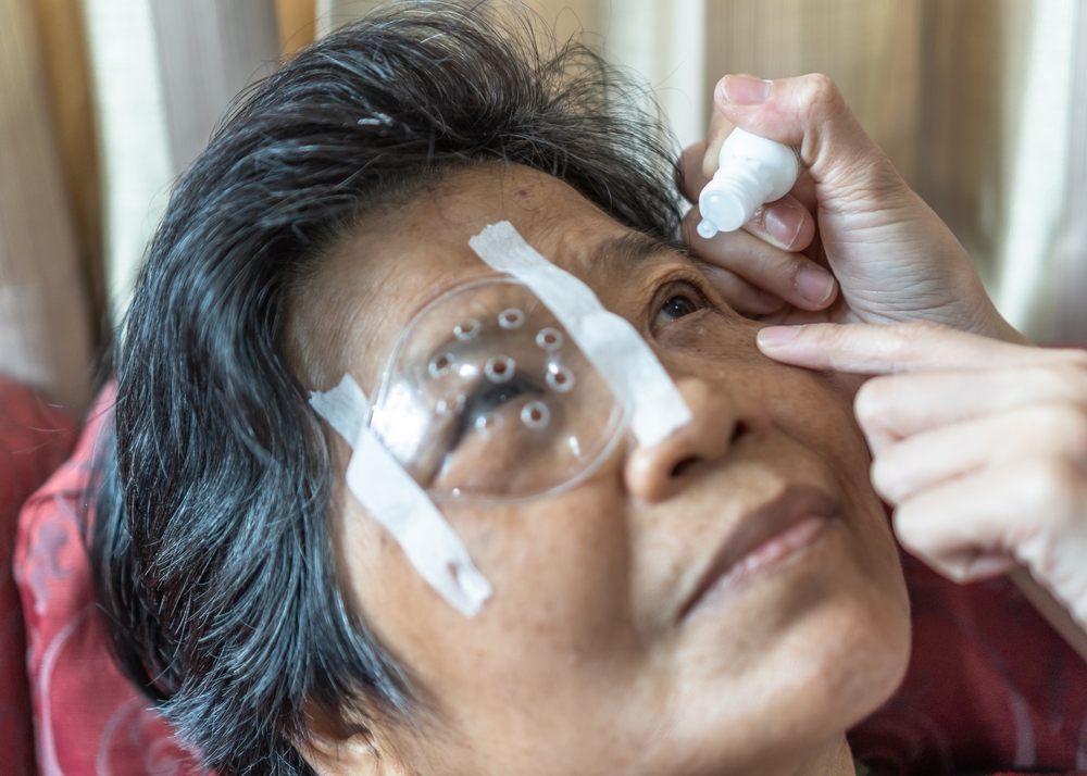 Cataract elderly patient, Asian old senior woman having eye care treatment on Age-related eye diseases, AMD, Diabetic retinopathy, retinal disorders problem, Retinal detachment, Glaucoma or low vision
