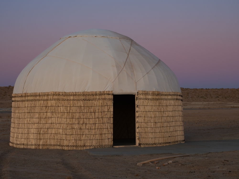 Derweze, Turkmenistan - October 15, 2019: Reed and canvas camping yurt near Darvaza Gas Crater or the
