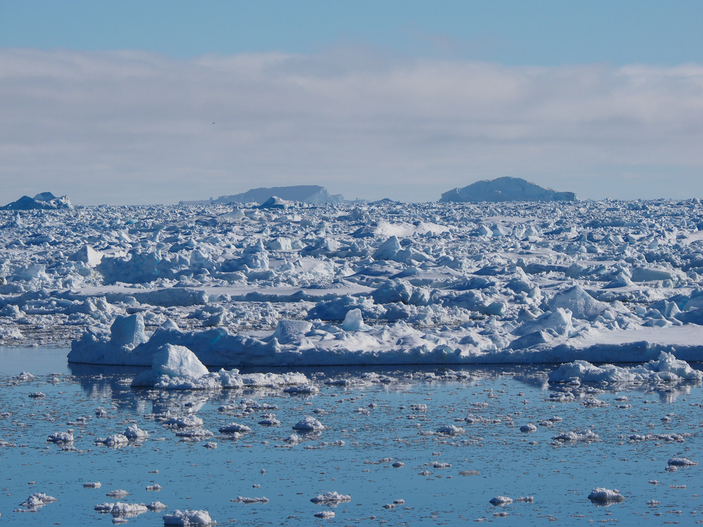 Antarctica blue iceberg landscape ocean mirror reflection