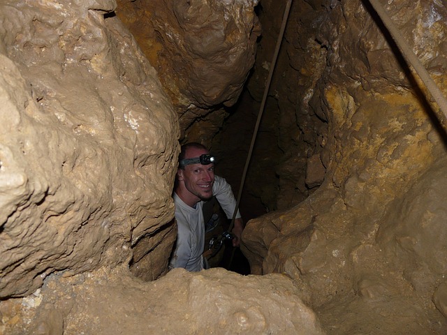 person caving