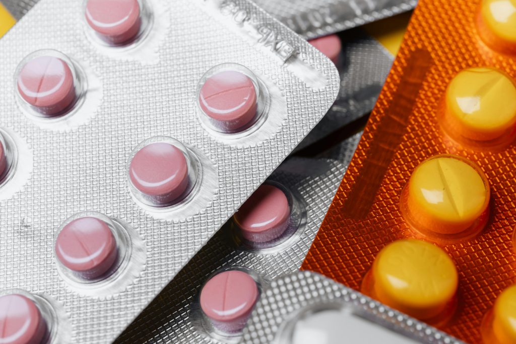Close-up Photo of Pills on Blister Packs
