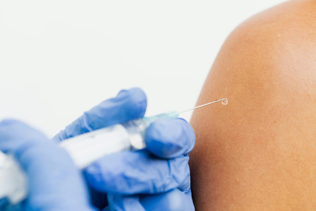Person Holding an Injection
