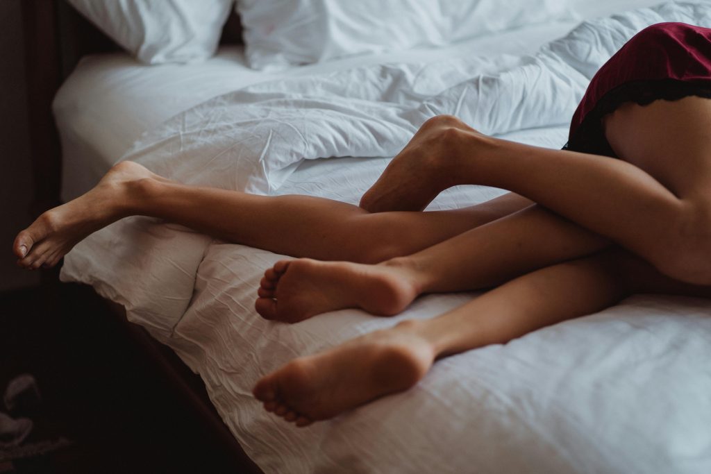 People Lying in Bed
