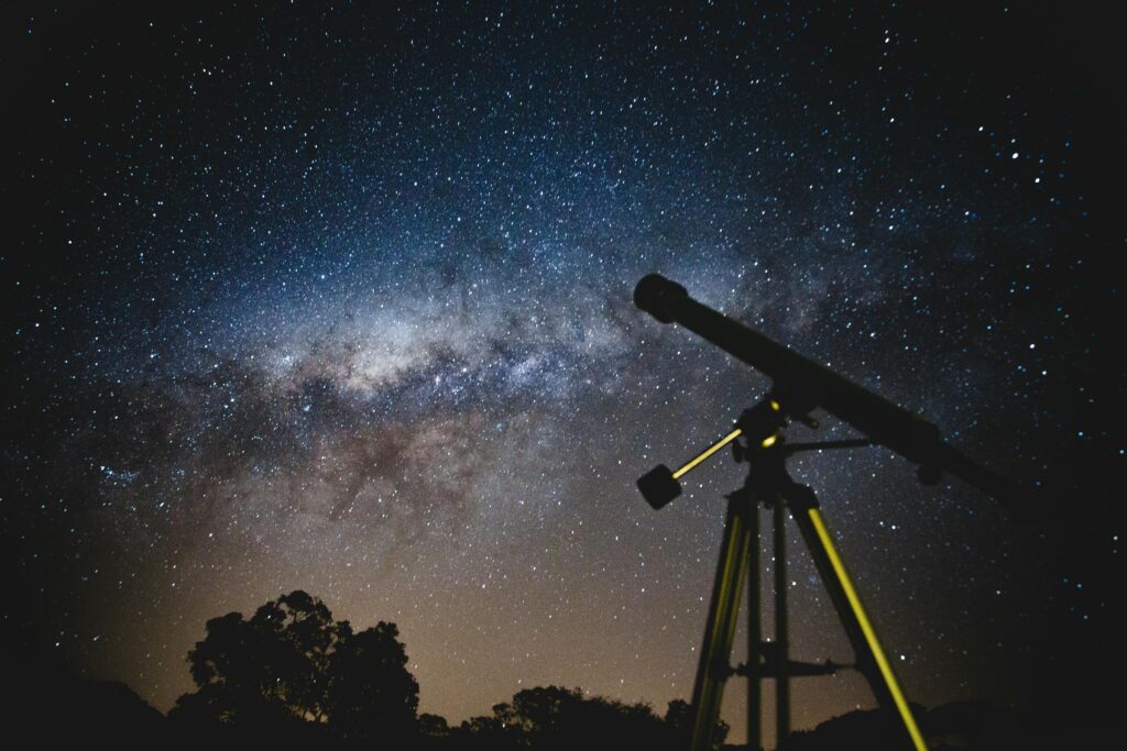 Black Telescope Under Blue and Blacksky
