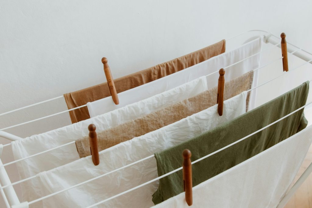 Clean Laundry Hanged on Dryer
