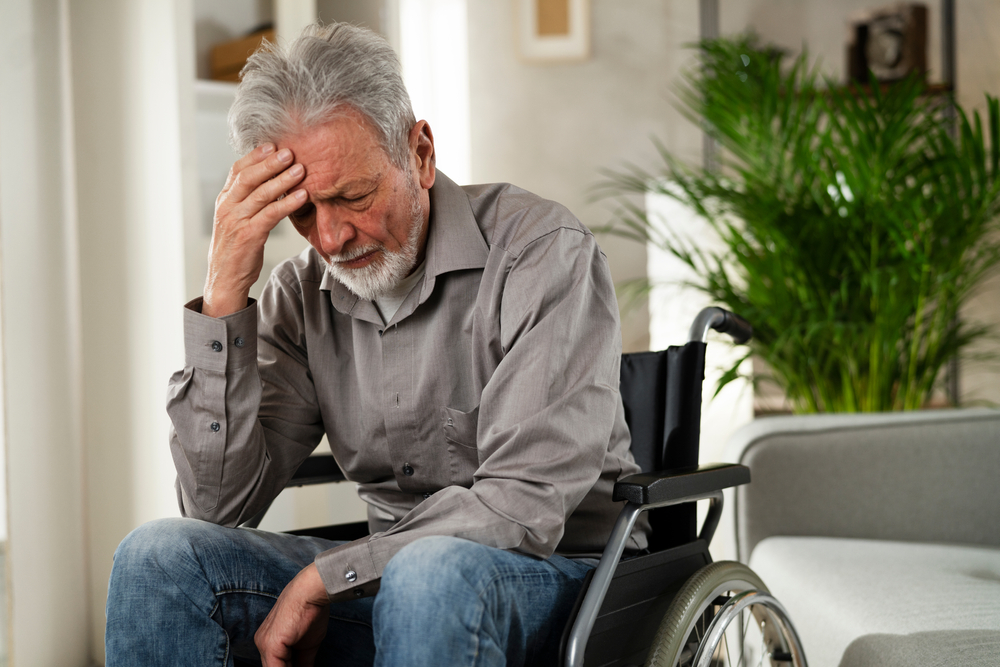 Disabled senior man in wheelchair.	
