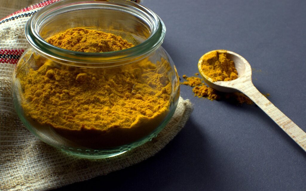 Turmeric, Manson jar, Spoon. 