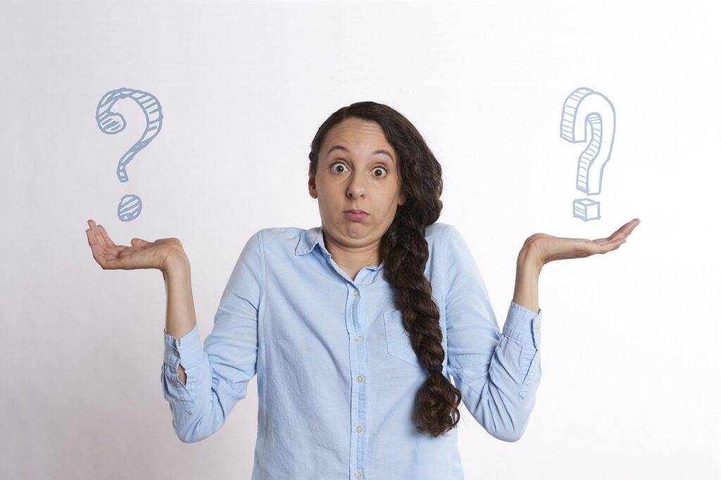 woman shrugging, questioning