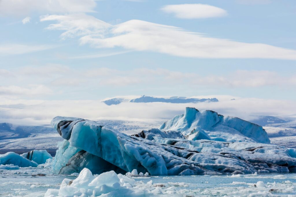 Slabs of Blue Ice Floating in Ocean