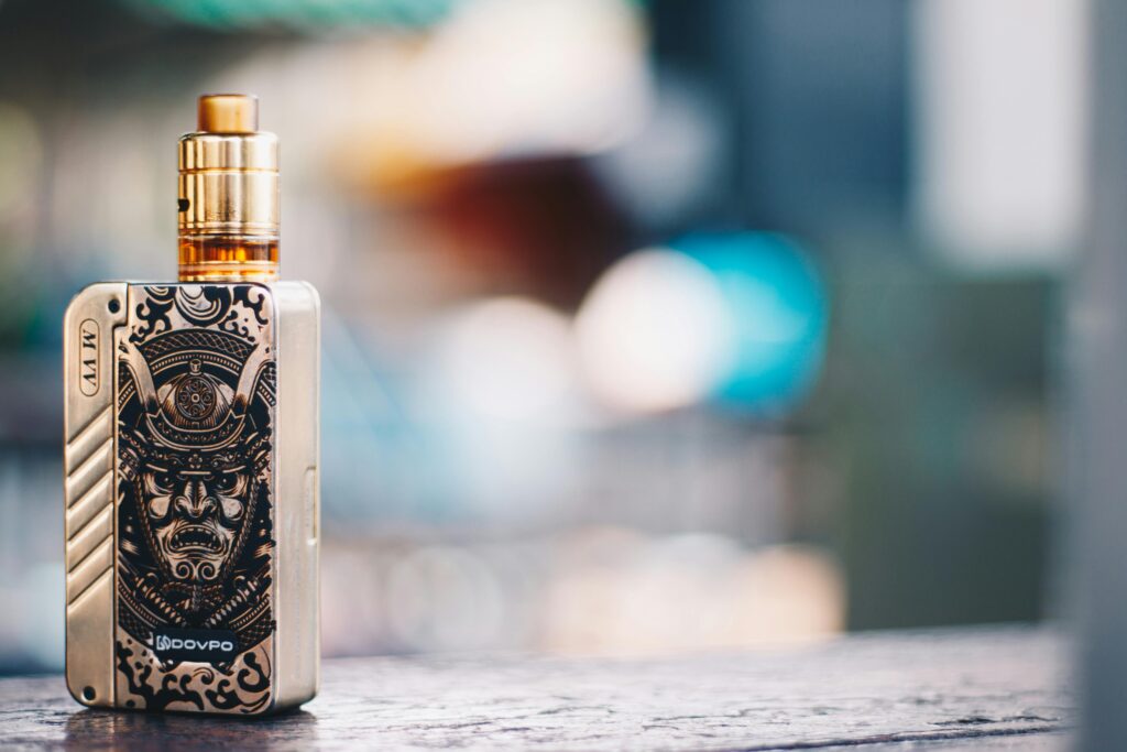 Close-up Photo of a Vape with Samurai Design
