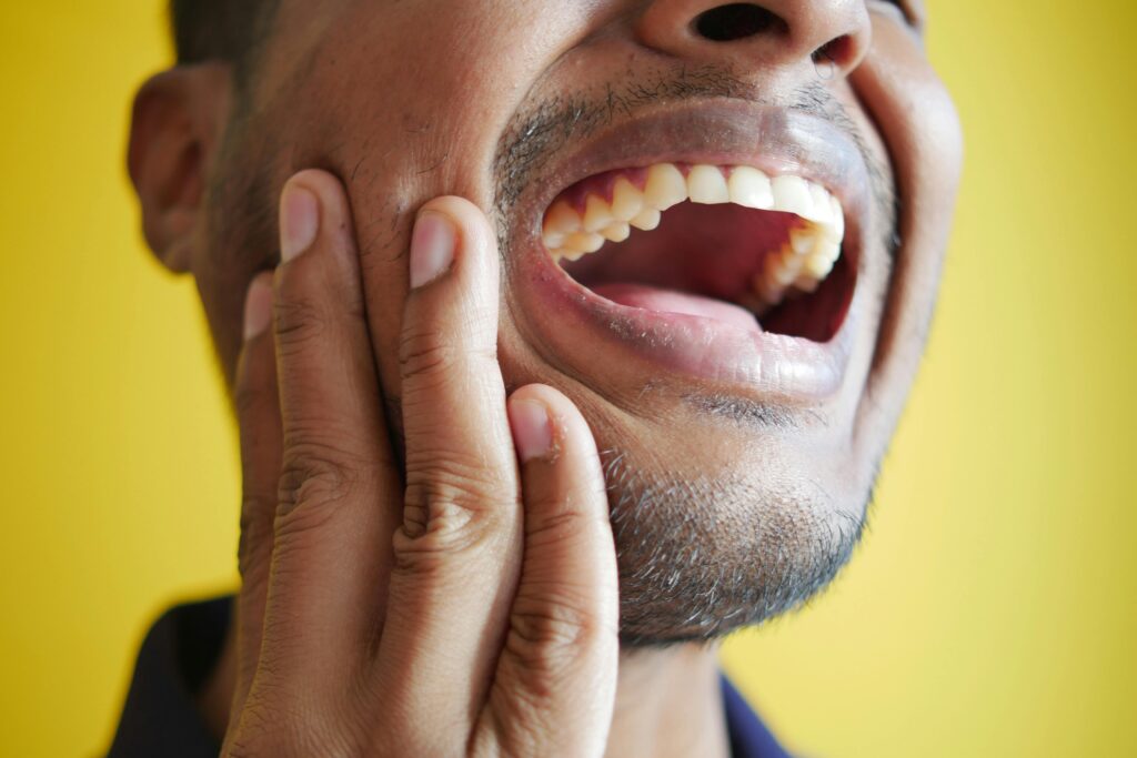 man with jaw pain