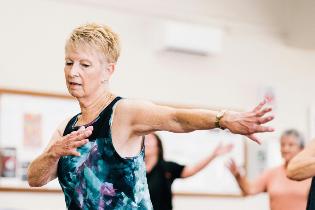 old woman doing aerobics