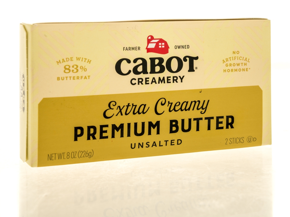 Winneconne, WI - 4 July 2025: A package of Cabot creamy extra creamy premium butter on an isolated background.