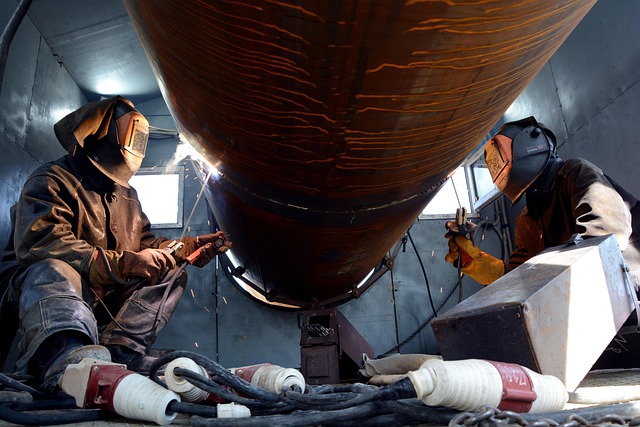 two people working in industrial environment