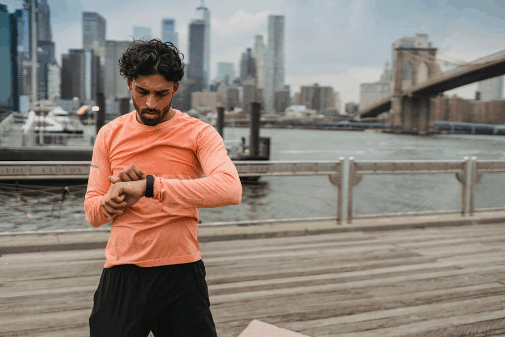 Man in Sports Clothing Checking his Stopwatch