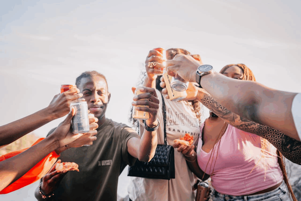 Group of Friends holding Can 