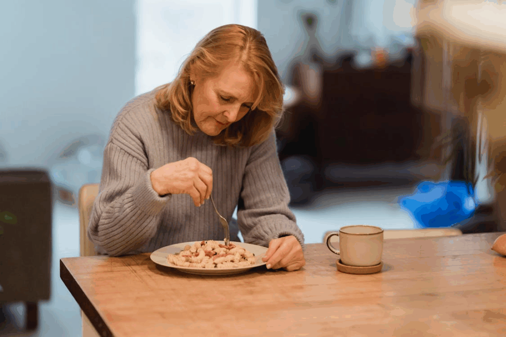 uninterested in food woman at table