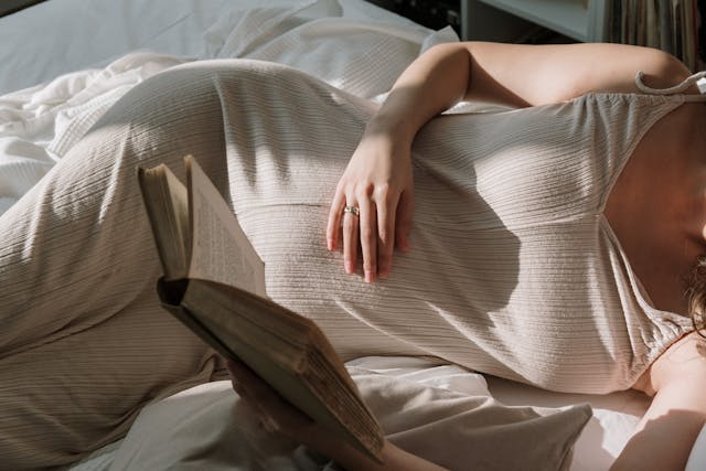 woman holding her stomach