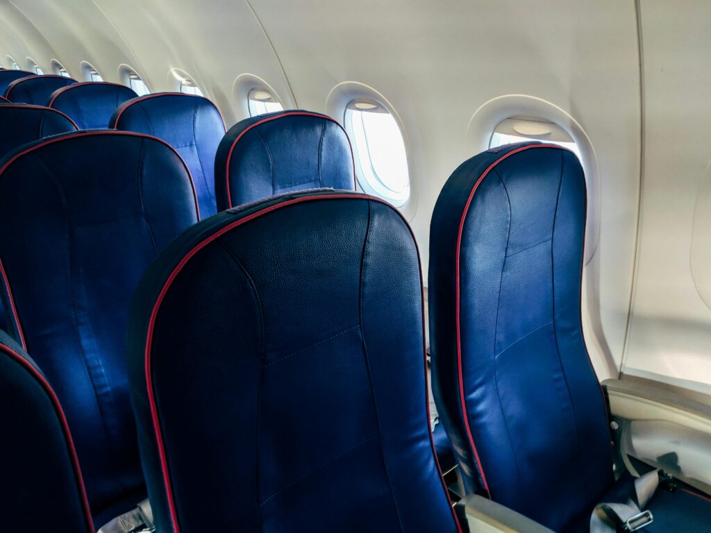 Empty Blue Airplane Seats
