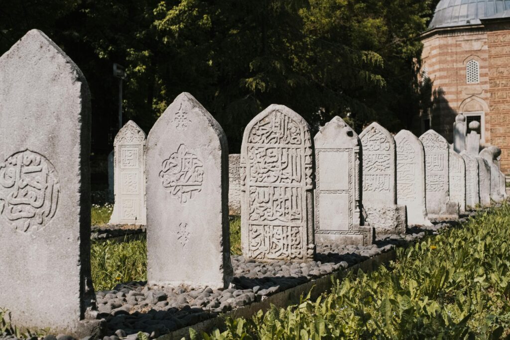 Gray Tombstones with Arabic Calligraphy
