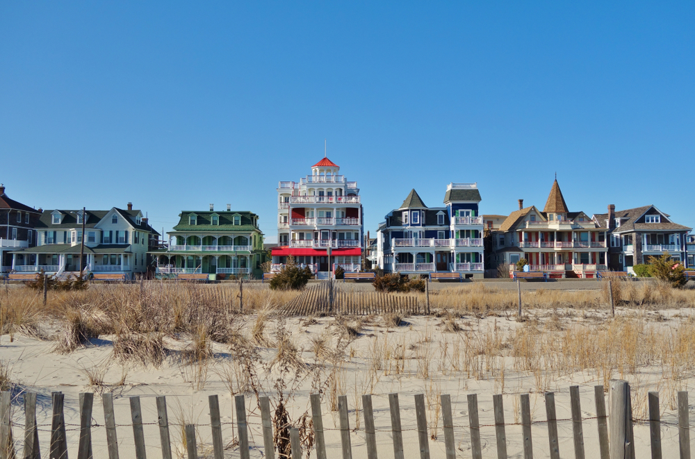 CAPE MAY, NJ -31 MAR 2018- Colorful historic Victorian houses line the beach front in Cape May, at the southern tip of Cape May Peninsula in New Jersey where the Delaware Bay and Atlantic Ocean meet.