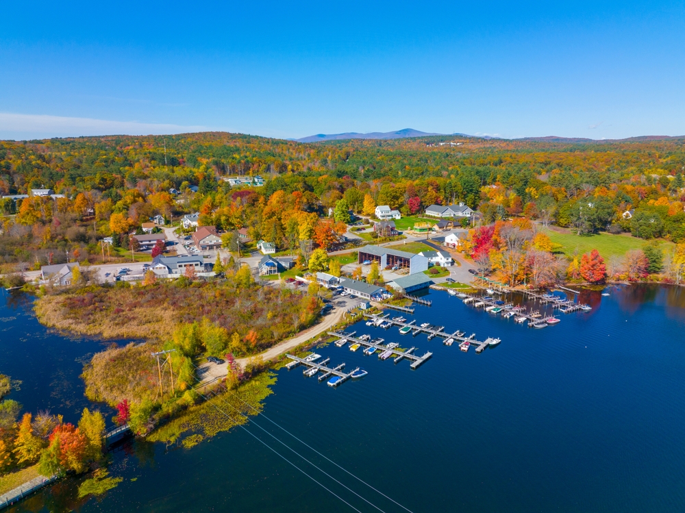 Wolfeboro historic town center at Back Bay at Lake Winnipesaukee aerial view in fall, town of Wolfeboro, New Hampshire NH, USA.