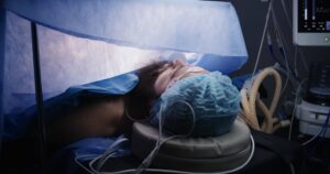 Close,Up,Of,Patient,During,Surgery.,Adult,Man,Lies,On