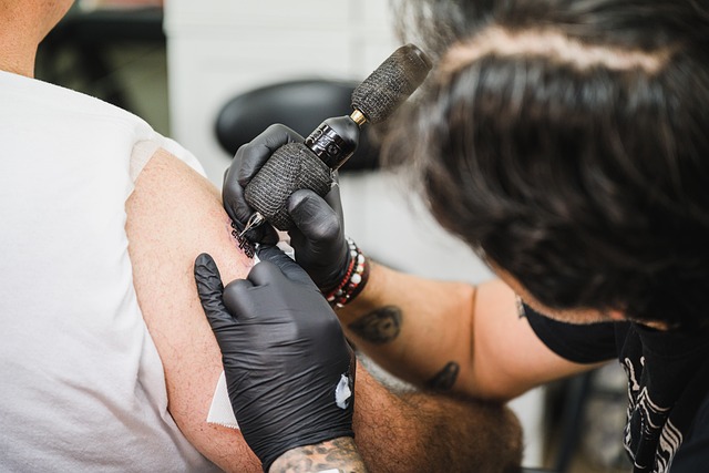 man getting a tattoo