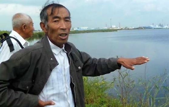 Wang talking about the pollution