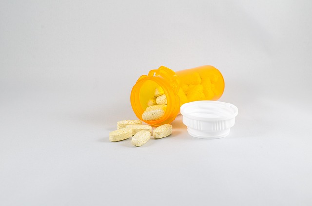 a bottle of pills on a white table