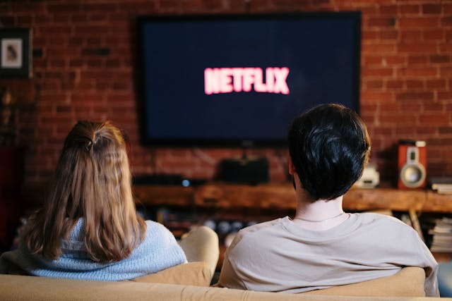 man and woman watching a streaming service