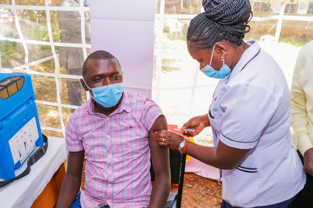 A man getting a booster shot