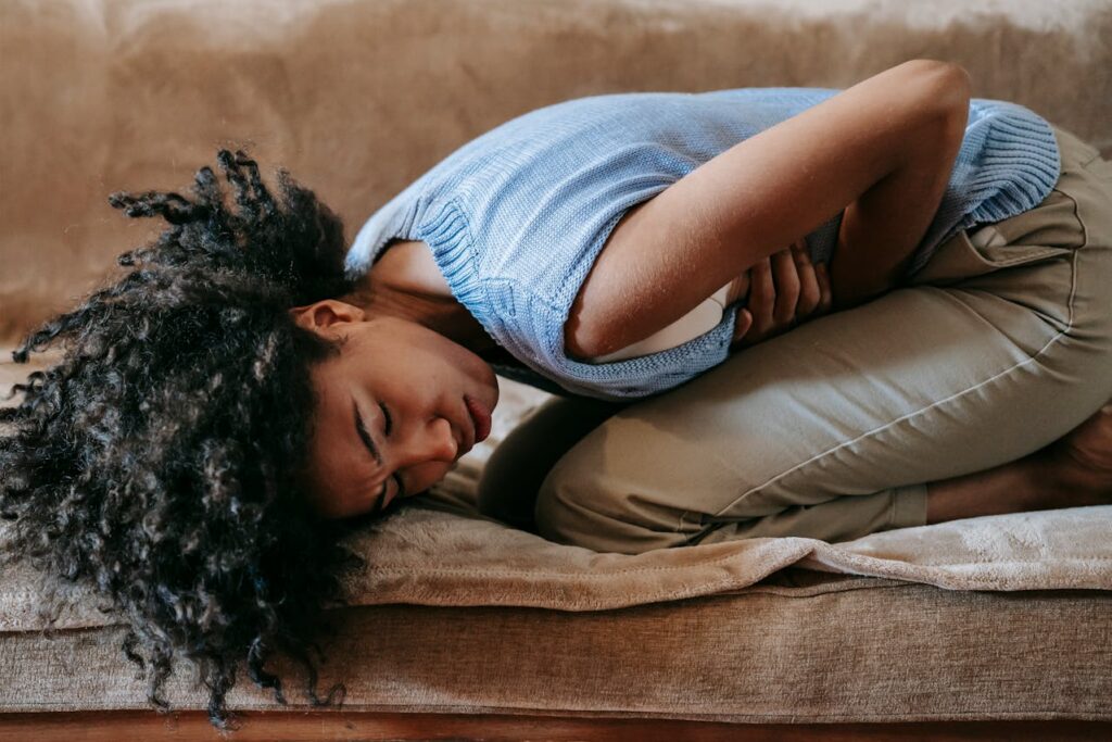 Woman Suffering from a Stomach Pain